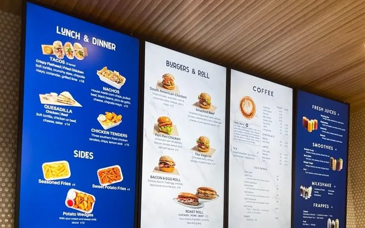 Restaurant interior with digital menu displays
